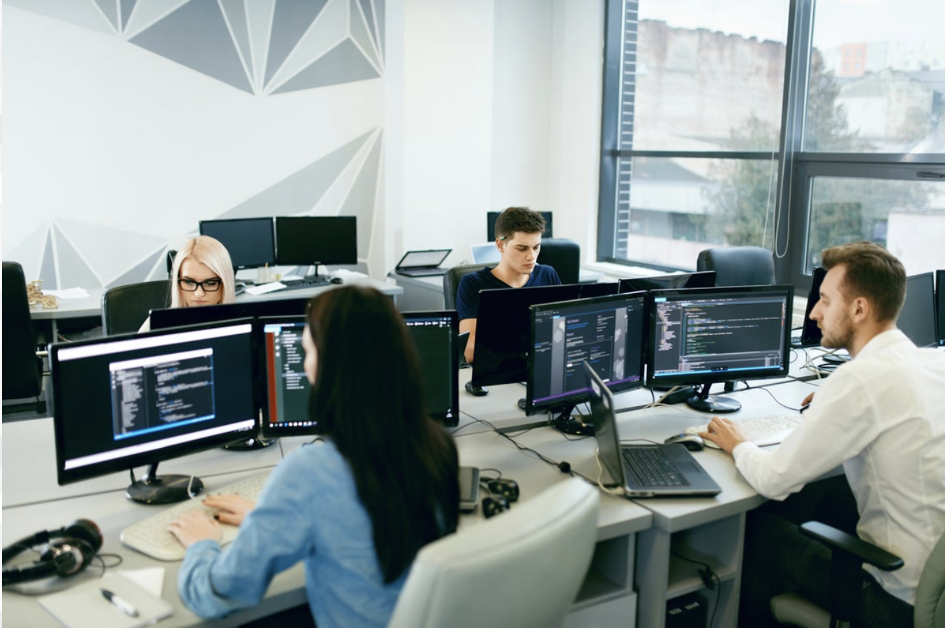 Coworkers at their computers